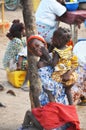 Mom and song in an African market