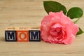 Mom spelled with colorful alphabet blocks Royalty Free Stock Photo