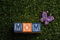 Mom spelled with colorful alphabet blocks Royalty Free Stock Photo