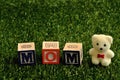 Mom spelled with colorful alphabet blocks Royalty Free Stock Photo