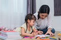 Mom teaching her daughter to drawing in art class. Back to school and Education concept. Children and kids theme. Home sweet home Royalty Free Stock Photo