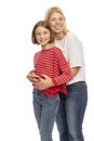 Mom and teen daughter embrace and laugh