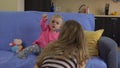 Mom try interrupt baby daughter girl watching television