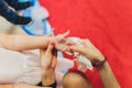 Mom wipes her daughter s palm with a damp napkin. Mom cares for her little daughter. Photo of children`s palms and Royalty Free Stock Photo