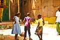 MOMBASSA, KENYA. DECEMBER 18, 2011: A group of Kenyan children play on the dusty street.