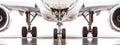 In a moment of anticipation, a large airliner prepares to embark on a thrilling journey. Close-up of landing gear, sparse image, Royalty Free Stock Photo