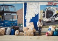 A moment of pause: man amidst boxes and luggage at La Quiaca Bus Station Royalty Free Stock Photo