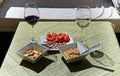 Wine and appetizer, time to relax with your couple. Royalty Free Stock Photo