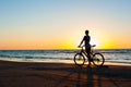 Moment in time. Sporty woman cyclist silhouette on multicolored Royalty Free Stock Photo