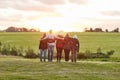 Moments like these make life worth living. Rearview shot of a group of friends admiring the view together on a weekend