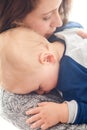 Mommy, baby and sleeping for hug in home, security and support in bonding for wellness or trust. Mother, toddler and