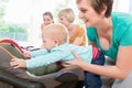 Moms and babies in mother and child course practicing Royalty Free Stock Photo
