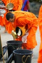 Mon buddhist monks collecting alms