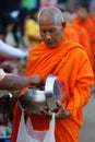 Mon buddhist monks collecting alms