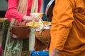 offer food into Thai Monk begging bowl Royalty Free Stock Photo