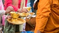 Mon people offer food to Thai Monk begging bowl Royalty Free Stock Photo