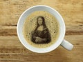 Mona lisa in coffee froth Royalty Free Stock Photo