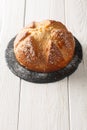 Mona or mouna of Easter is a traditional mediterranean sweet bread baked to celebrate Easter closeup. Vertical