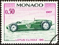 MONACO - CIRCA 1967: A stamp printed in Monaco shows Lotus-Climax Grand Prix racing car of 1961, winner of Monaco Grand Prix