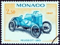 MONACO - CIRCA 1967: A stamp printed in Monaco shows Peugeot Grand Prix racing car of 1910, circa 1967.