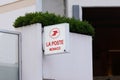 La poste Monaco sign brand french post logo on building facade store