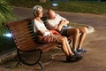 Monaco France 16 August 2017 : Man is sleeping on a park bench in the city . Homeless couple Royalty Free Stock Photo