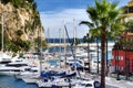 Monaco, Monaco - January 28, 2020: Bay with yachts and Prince Palace on rock in Mediterranean Sea Royalty Free Stock Photo