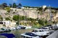 Monaco, Monaco - January 28, 2020: Bay with yachts and Prince Palace on rock in Mediterranean Sea Royalty Free Stock Photo