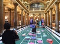 Monaco - June 20, 2019: Tourists inside the Monte Carlo Casino in Monaco Royalty Free Stock Photo