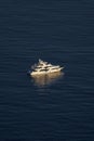 Monaco, lonely mega yacht in sea at sunset, huge motor boat, wealth life of billionaires