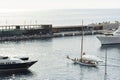 Monaco, Monte Carlo, 23 October 2022: Vintage sailing boat Tuiga 1909 leaves the port Hercules, the team prepares the