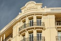 Monaco, Monte Carlo, 27 September 2022: The facade of famous Hotel Hermitage at sunny day, building of yellow color