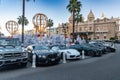 Monaco, Monte-Carlo, 25 December 2019: The square Casino Monte-Carlo at sunset, white Christmas trees, hotel the Paris, sunny day Royalty Free Stock Photo