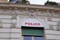 Monaco police sign on outdoor office building facade wall Royalty Free Stock Photo