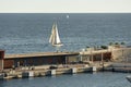 Monaco, Monte Carlo, 23 October 2022: Vintage sailing boat Tuiga 1909 going to the port Hercules, the team prepares the