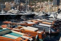 Monaco, Monte Carlo, 28 September 2022 - Riva boats in a row and a lot of luxury mega yachts at the famous motorboat Royalty Free Stock Photo