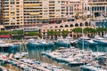 Monaco, Monte Carlo. Yachts Moored Near City Pier, Jetty In Sunny Summer Day