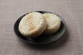 Monaka japanese confectionery wafers cake on plate on table cloth Royalty Free Stock Photo