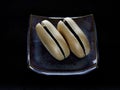 Monaka, a traditional Japanese cake, made of bean jam sandwiched by the thin crisp wafers