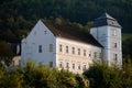 Monastery in an Alpine town in Austria at sunset. Royalty Free Stock Photo