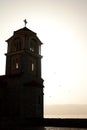 Monastery of Saint Naum belltower silhouette at sunset. North Macedonia