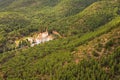 Monastery of Sancti Spiritu surrounded by dense green trees