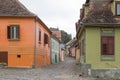 Monastery street in the castle of old city. Sighisoara city in Romania Royalty Free Stock Photo