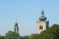 Monastery towers above tree tops Royalty Free Stock Photo