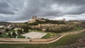Monastery at Ucles, Castilla la Mancha, Spain. cloudy sky Royalty Free Stock Photo