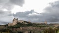 Monastery at Ucles, Castilla la Mancha, Spain. cloudy sky Royalty Free Stock Photo