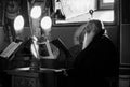 Monastic life of the hermit old monks in the orthodox church in Roumania , priest praying in solitude