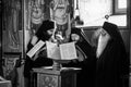 Monastic life of the hermit old monks in the orthodox church in Roumania , priest praying in solitude