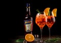 Monchegorsk, Murmansk region Russia. June 1, 2021. Wineglass of ice cold Aperol spritz cocktail served in a wine glass, decorated