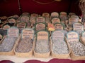 MONDONEDO, SPAIN - AUGUST 14, 2022: Herbal medicines for the treatment of various diseases at the medieval fair counter in the old